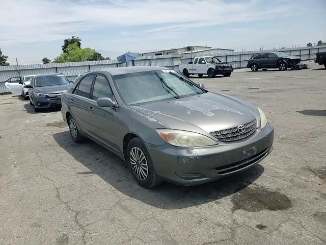 2003 Toyota Camry Le VIN: JTDBE32K830148010 Lot: 65672984