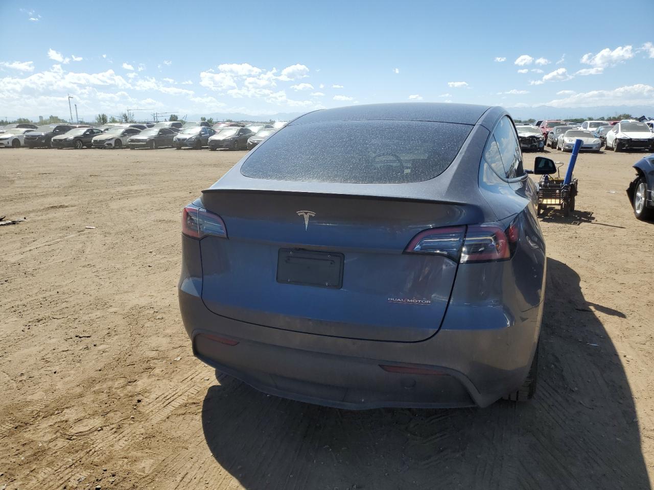 2023 Tesla Model Y VIN: 7SAYGDEF9PF884697 Lot: 67776394