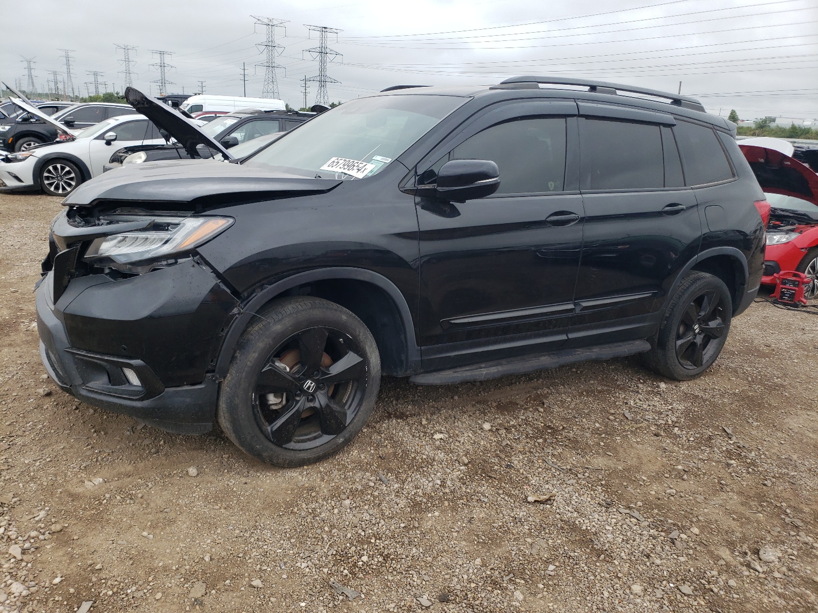 2021 Honda Passport Elite vin: 5FNYF8H06MB018644