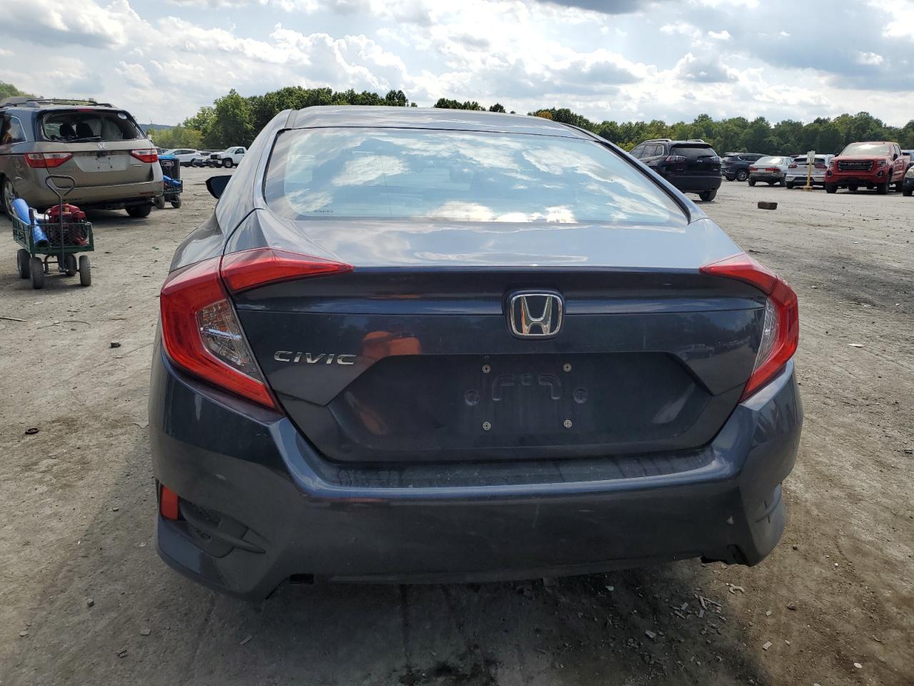 2018 Honda Civic Lx VIN: 2HGFC2F5XJH555374 Lot: 69678474