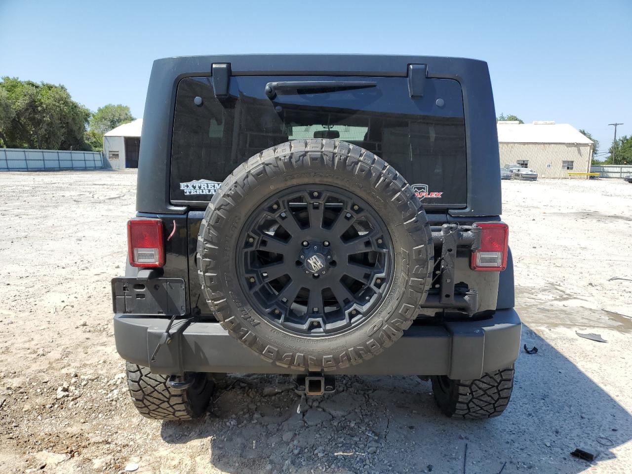 1C4BJWDG2EL100557 2014 Jeep Wrangler Unlimited Sport