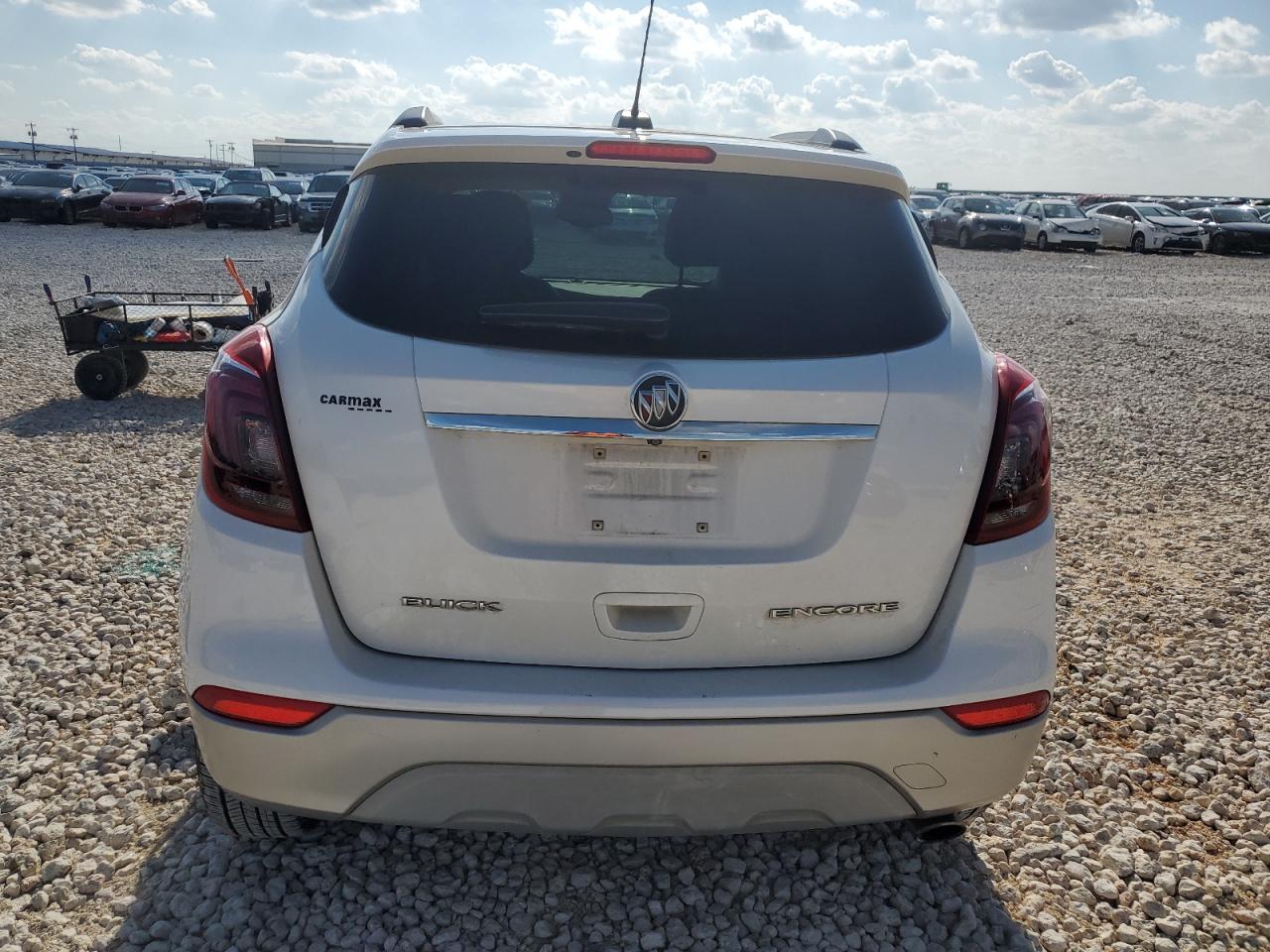 2018 Buick Encore Essence VIN: KL4CJCSB6JB549485 Lot: 69876364