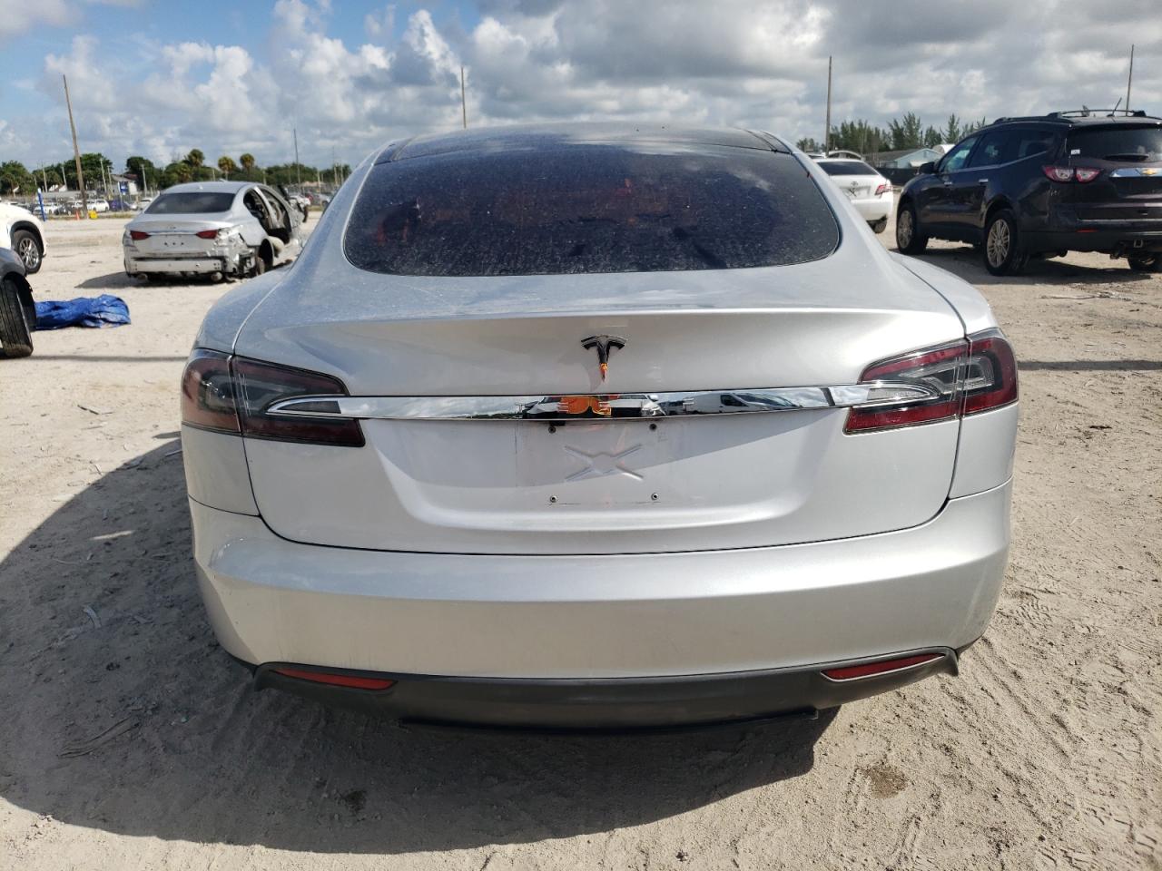 2013 Tesla Model S VIN: 5YJSA1CG1DFP16594 Lot: 69311364