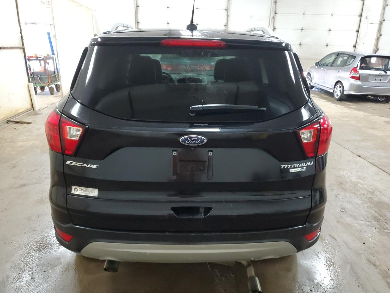 2019 Ford Escape Titanium VIN: 1FMCU9J92KUC00694 Lot: 64375314