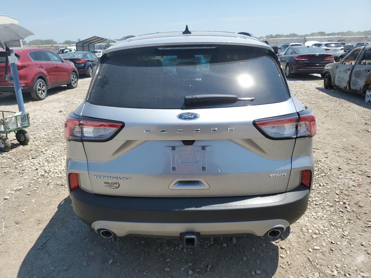 2021 Ford Escape Titanium VIN: 1FMCU9J94MUA30504 Lot: 65946984