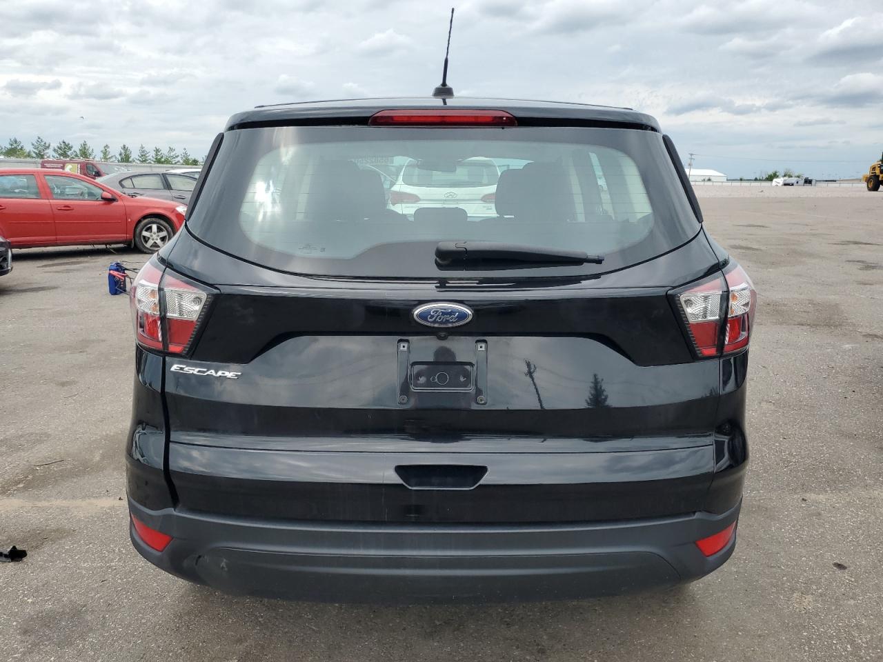 2018 Ford Escape S VIN: 1FMCU0F73JUD04709 Lot: 65822504