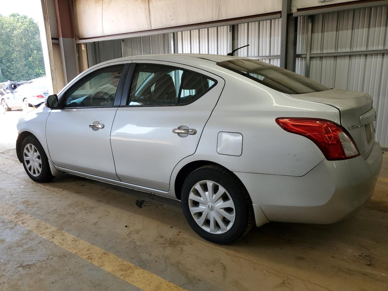 2012 Nissan Versa S VIN: 3N1CN7AP5CL945135 Lot: 69521304