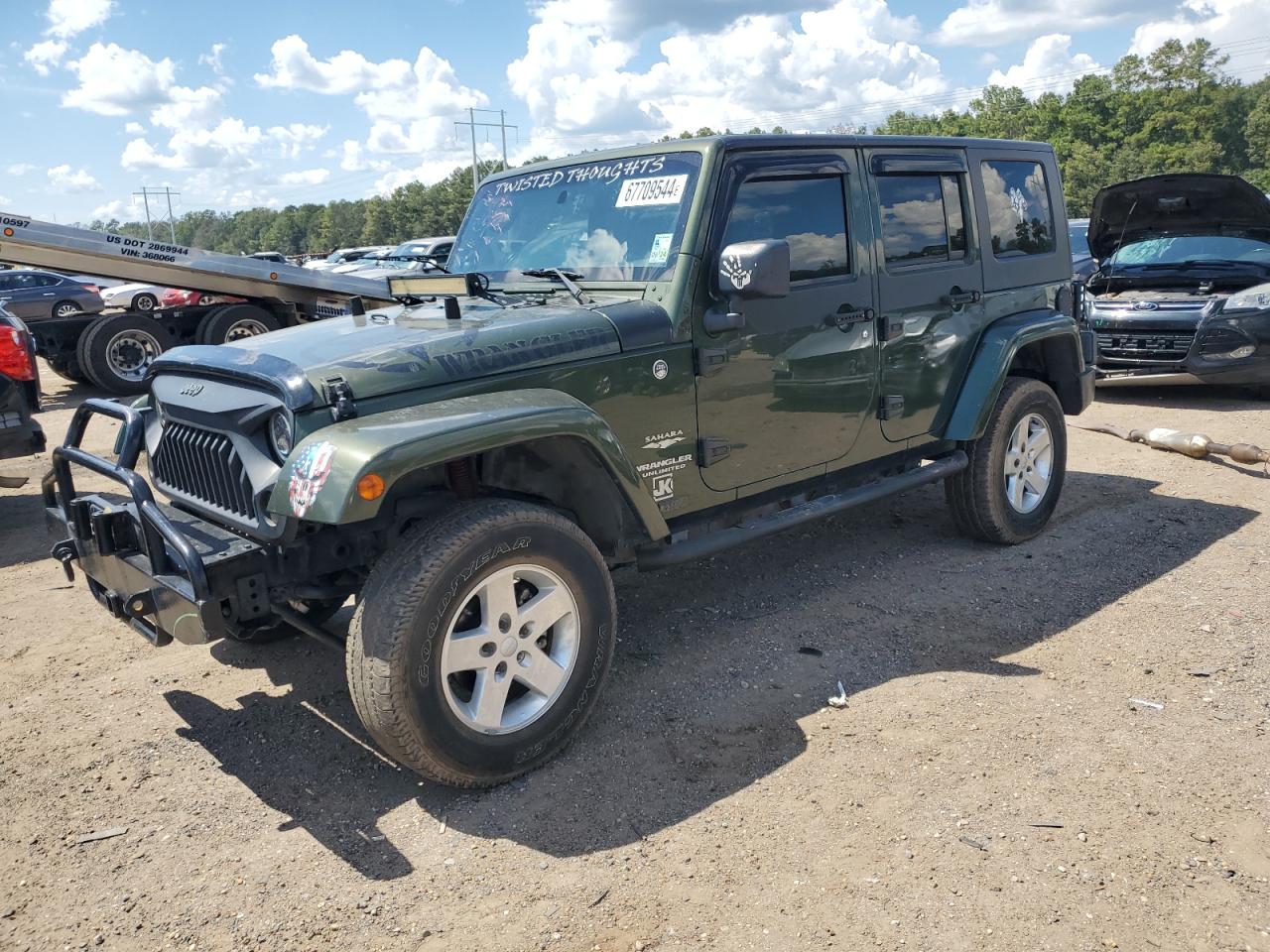 2007 Jeep Wrangler Sahara VIN: 1J4GA59197L107829 Lot: 67709544