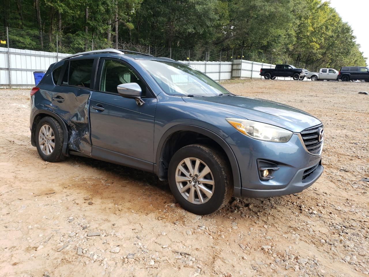 2016 Mazda Cx-5 Touring VIN: JM3KE2CY9G0642743 Lot: 69535534