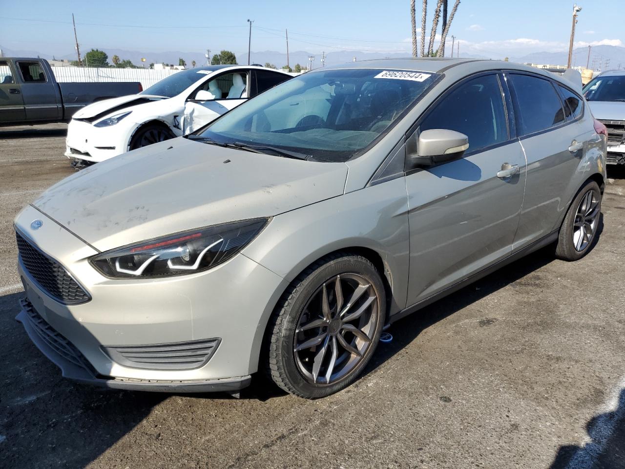 2016 Ford Focus Se VIN: 1FADP3K20GL263505 Lot: 69620544