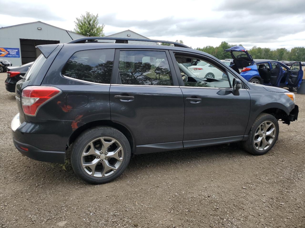 2015 Subaru Forester 2.5I Touring VIN: JF2SJCTC4FH831753 Lot: 66145314