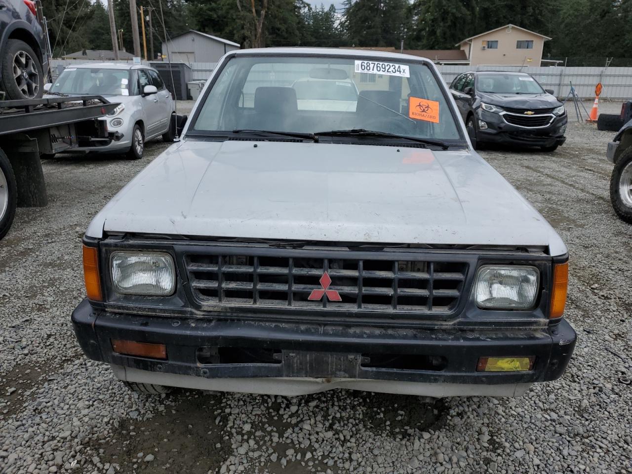 1990 Mitsubishi Mighty Max / S VIN: JA7FL24W2LP023428 Lot: 68769234