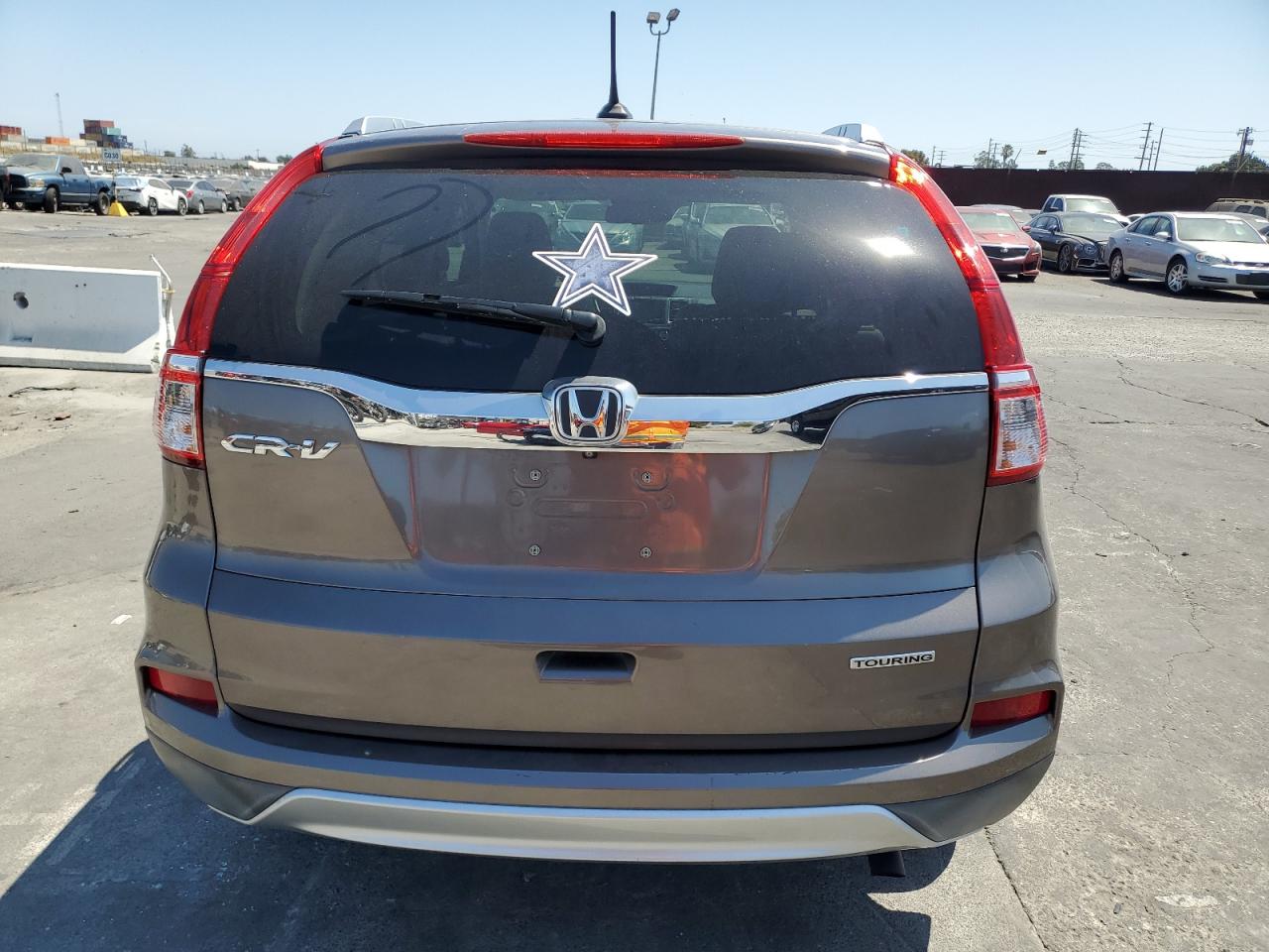 2016 Honda Cr-V Touring VIN: 5J6RM3H96GL010700 Lot: 65937854