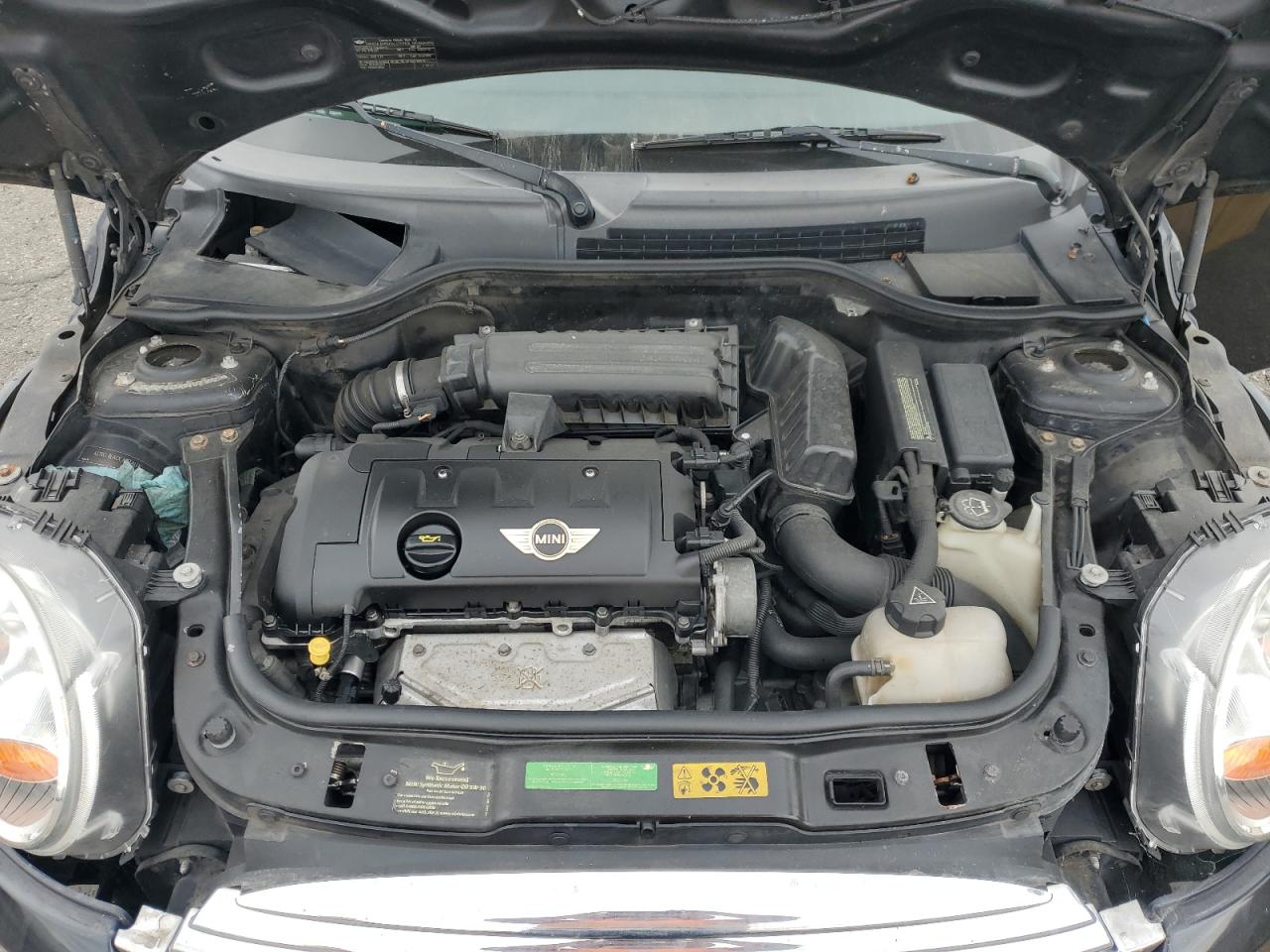 2009 Mini Cooper VIN: WMWMF335X9TU71607 Lot: 65685424