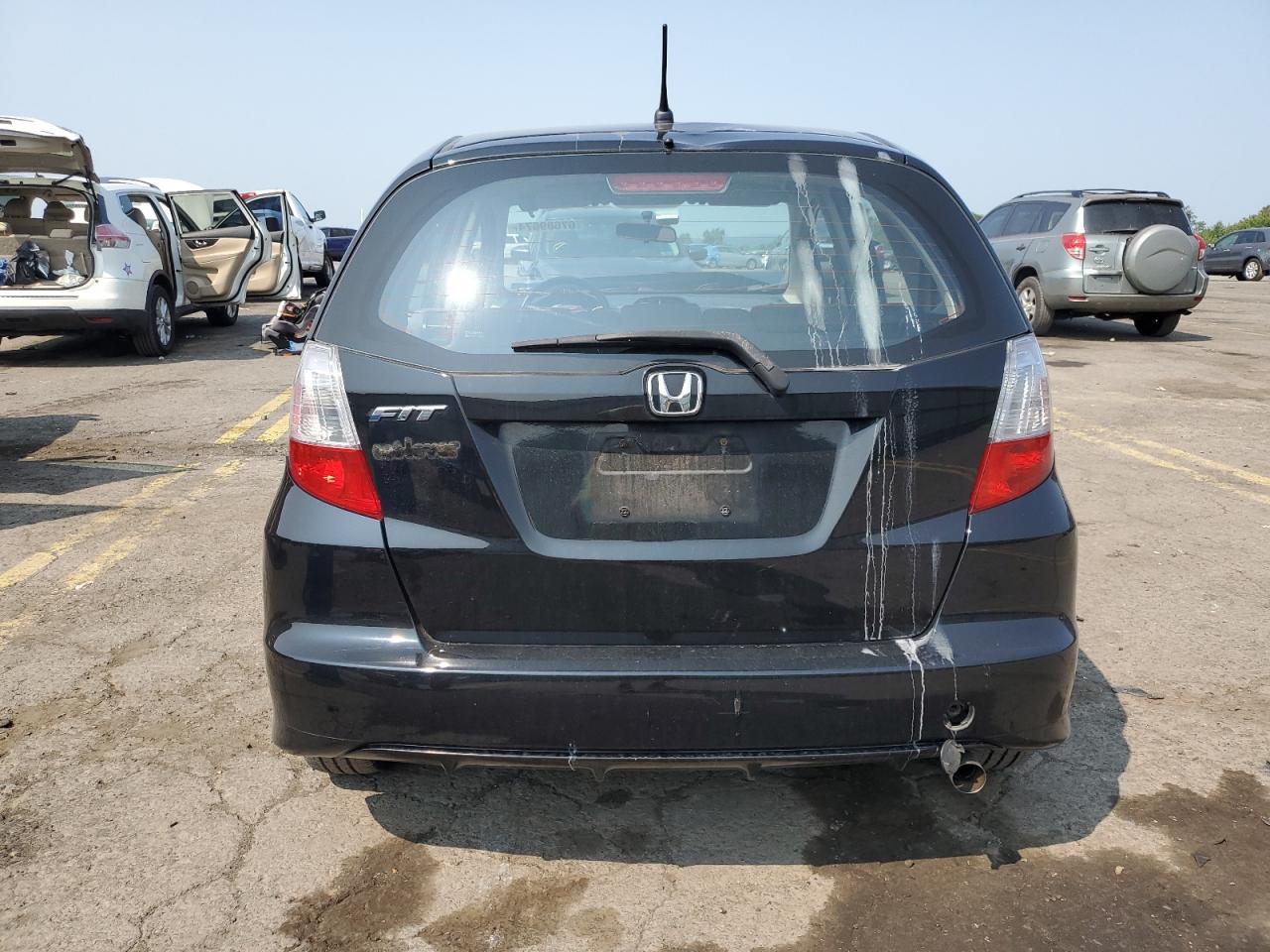 2013 Honda Fit VIN: JHMGE8H30DC039767 Lot: 67689674