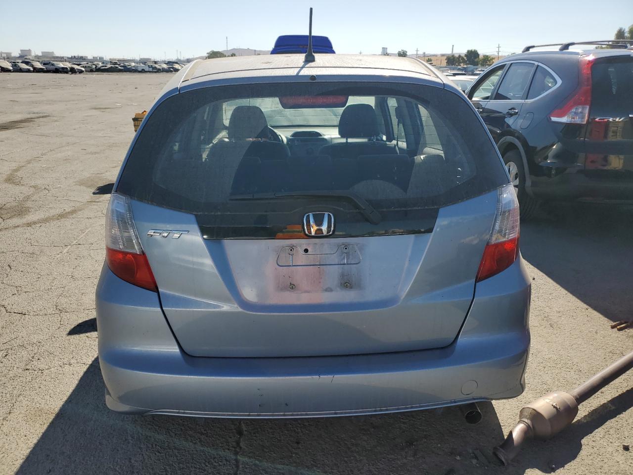 2011 Honda Fit VIN: JHMGE8H30BC021718 Lot: 68384534