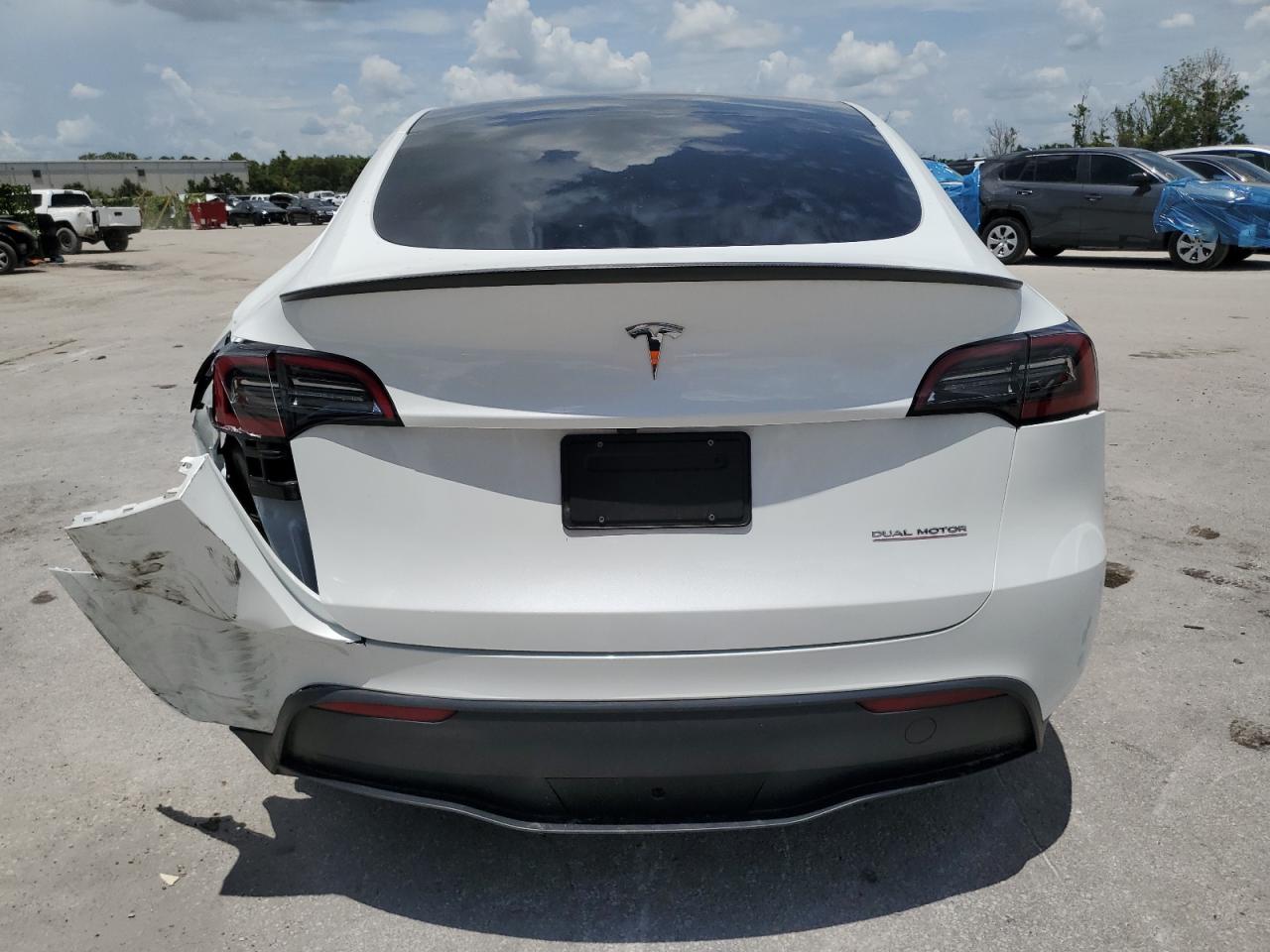 2023 Tesla Model Y VIN: 7SAYGDEF1PF830259 Lot: 65750924