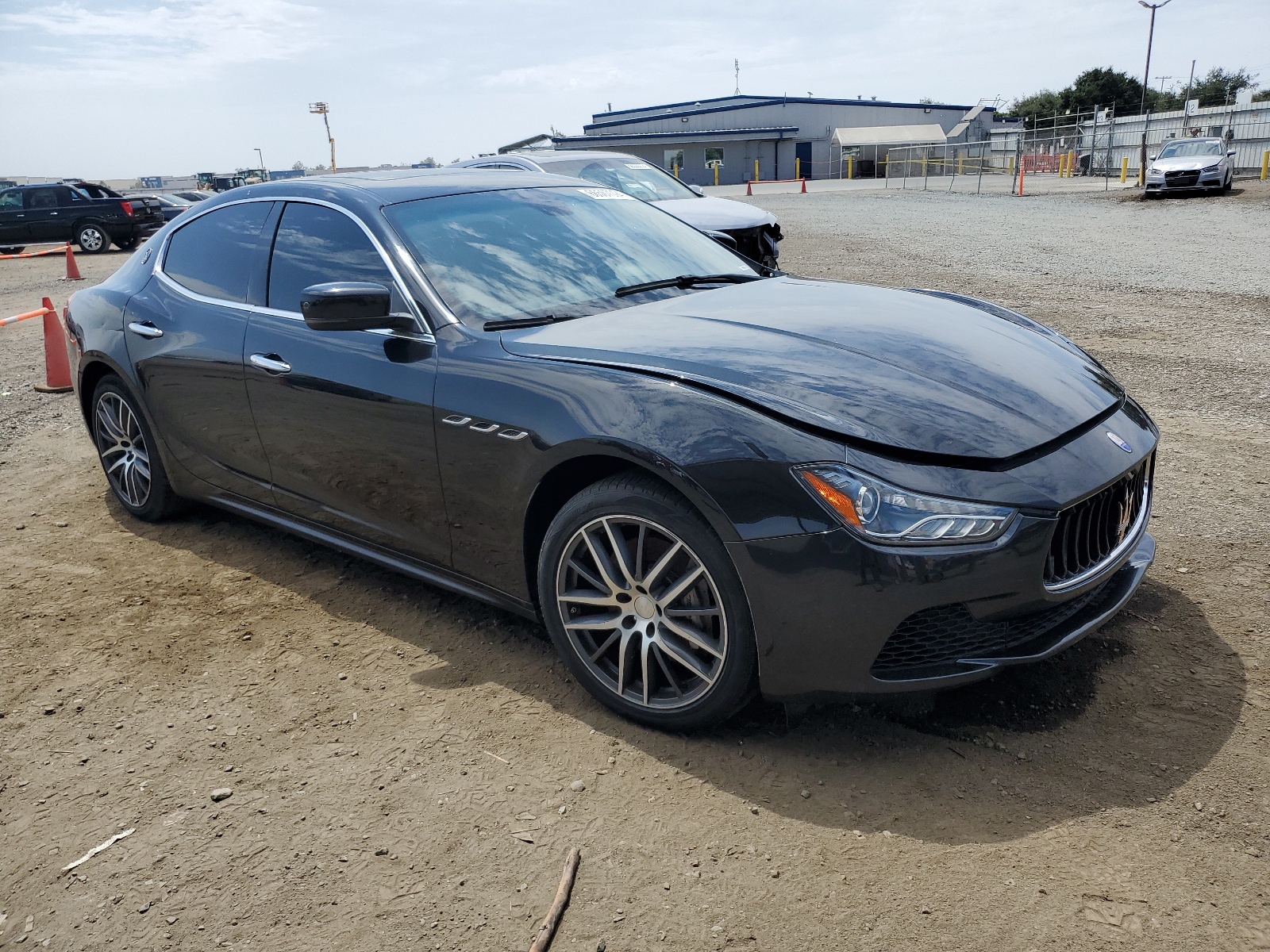 2014 Maserati Ghibli vin: ZAM57XSA5E1090243