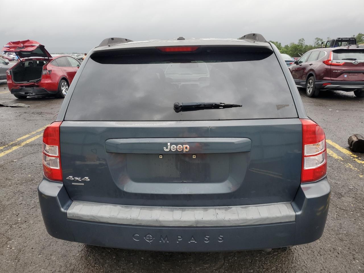 2007 Jeep Compass VIN: 1J8FF47W57D110564 Lot: 66733804