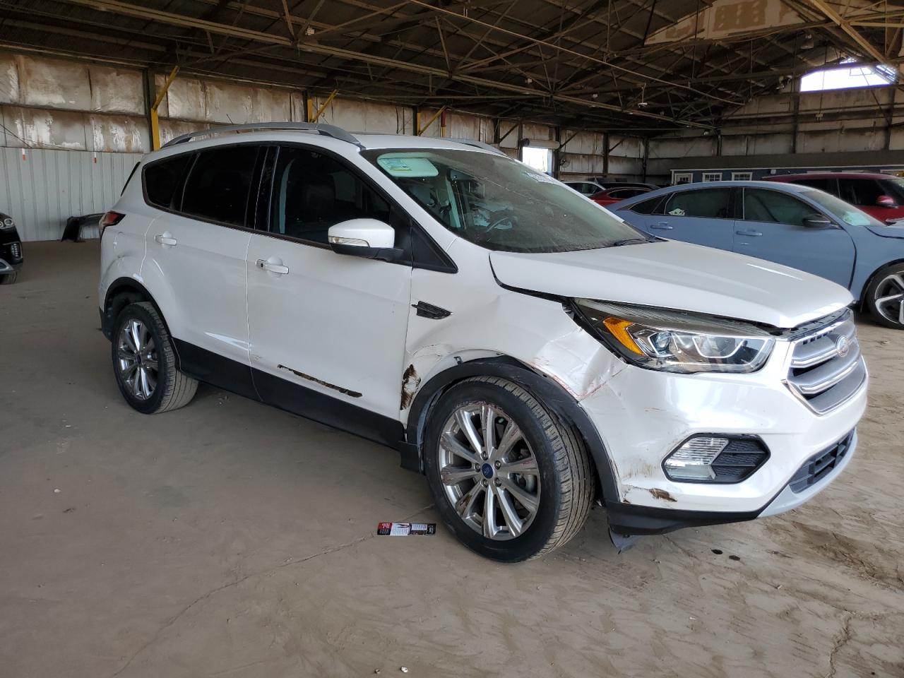 2017 Ford Escape Titanium VIN: 1FMCU0J98HUE55001 Lot: 65577794