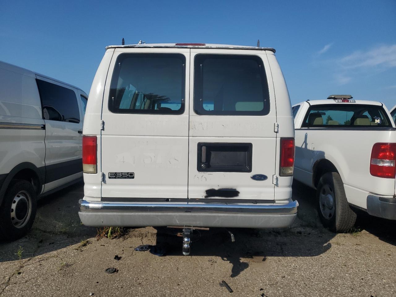 1999 Ford Econoline E350 Super Duty Wagon VIN: 1FBSS31LXXHA28806 Lot: 65947394