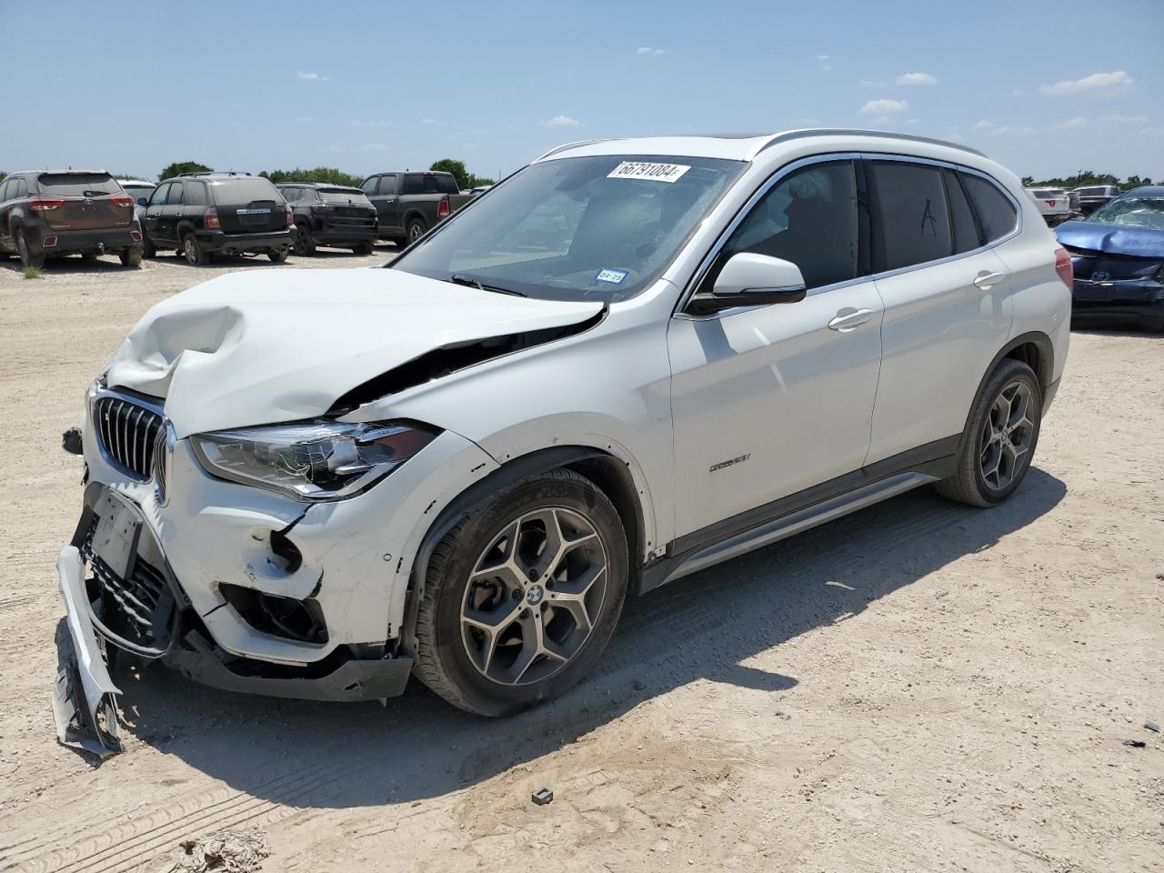 WBXHU7C33H5H35484 2017 BMW X1 - Image 1