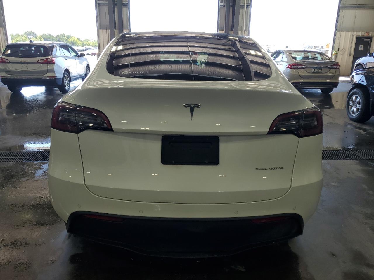 2021 Tesla Model Y VIN: 5YJYGAEEXMF179731 Lot: 69702344