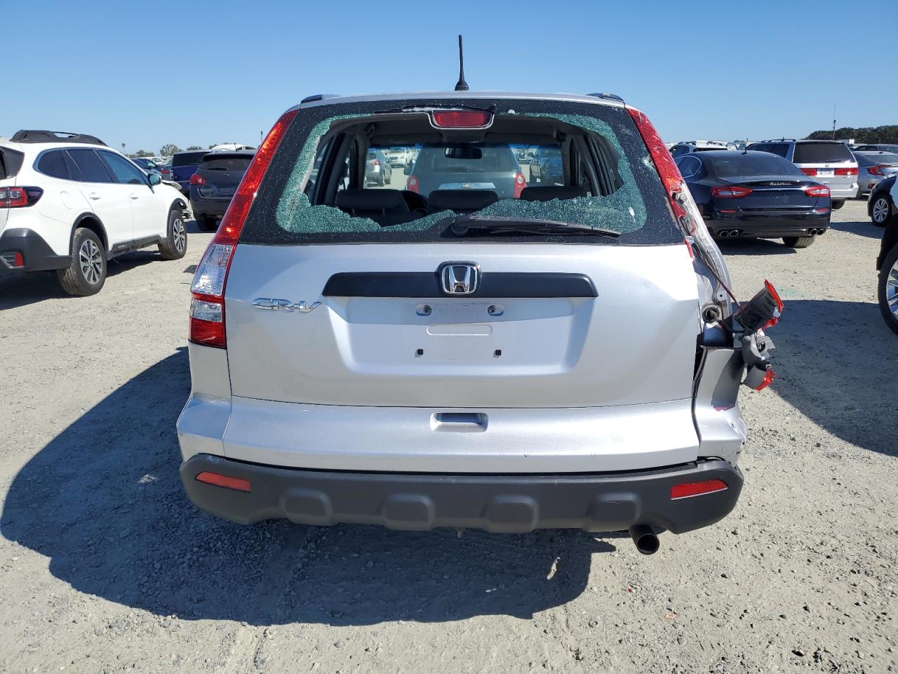 2009 Honda Cr-V Lx VIN: 3CZRE383X9G702600 Lot: 68360364