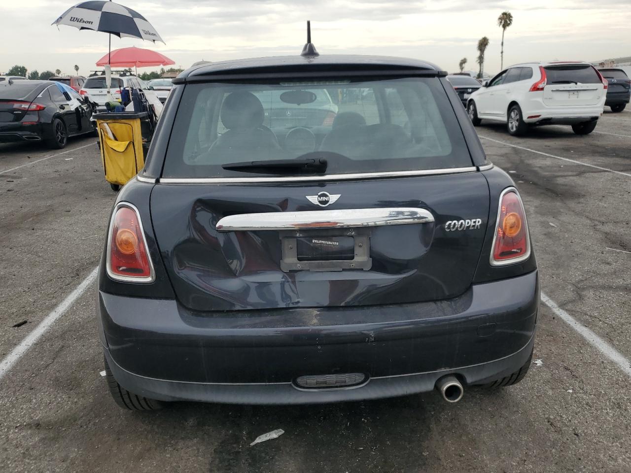 2009 Mini Cooper VIN: WMWMF335X9TU71607 Lot: 65685424
