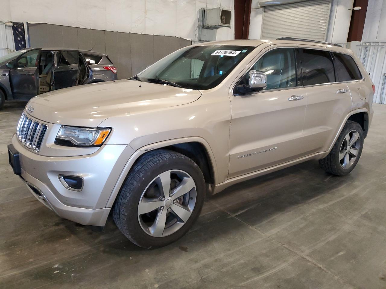 2015 Jeep Grand Cherokee Overland VIN: 1C4RJFCG0FC921822 Lot: 64700664