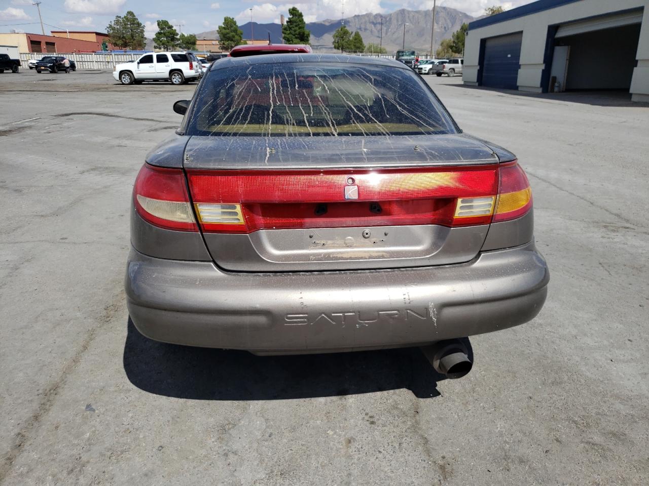 1999 Saturn Sc1 VIN: 1G8ZN1288XZ310351 Lot: 76677414