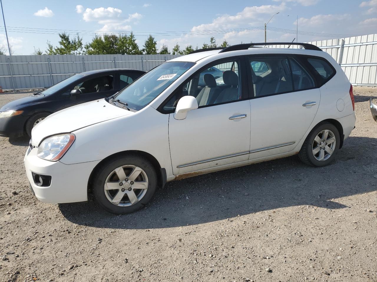 2009 Kia Rondo Base VIN: KNAFG528997253972 Lot: 66498924