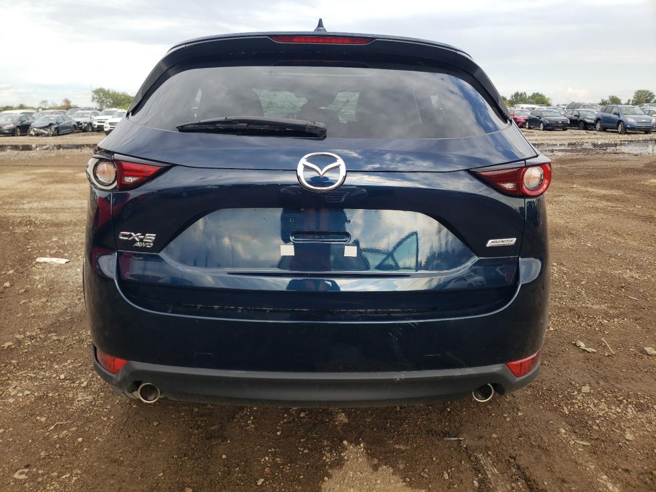 2019 Mazda Cx-5 Grand Touring VIN: JM3KFBDM1K0699357 Lot: 69495904