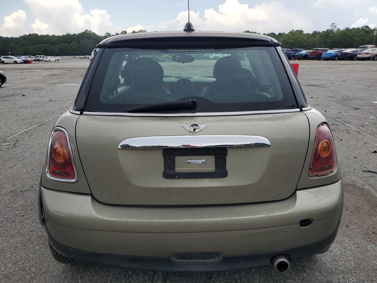 2010 Mini Cooper VIN: WMWMF3C55ATZ66334 Lot: 65843474