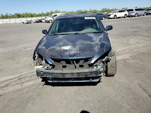 2003 Toyota Camry Le VIN: 4T1BE32K03U209791 Lot: 66786704