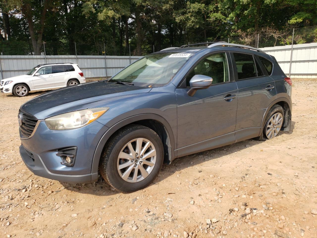 2016 Mazda Cx-5 Touring VIN: JM3KE2CY9G0642743 Lot: 69535534