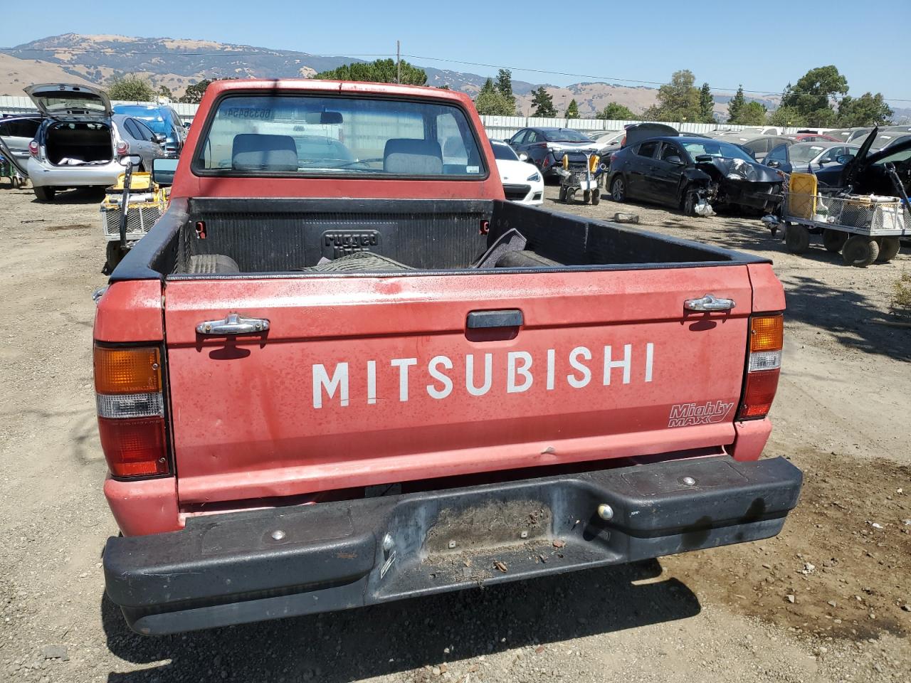 1987 Mitsubishi Mighty Max / S VIN: JA7FL24D3HP065774 Lot: 66336454