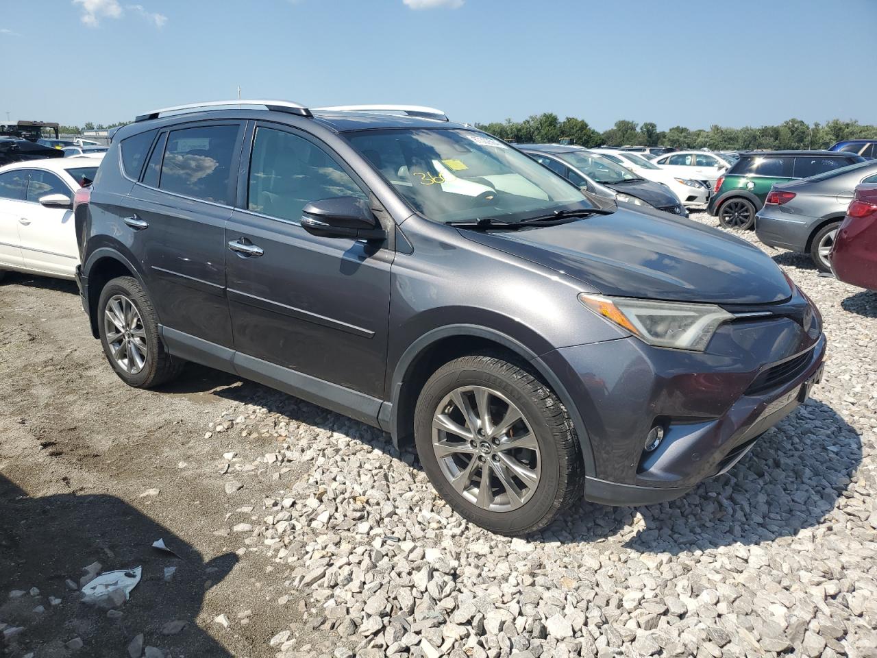 VIN JTMDFREV4GJ085132 2016 TOYOTA RAV4 no.4