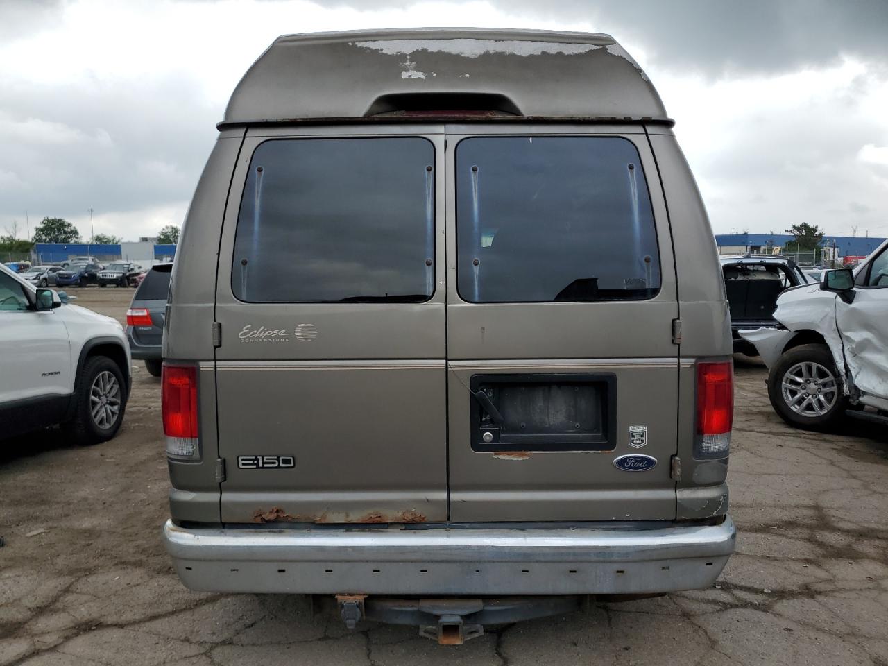 2003 Ford Econoline E150 Van VIN: 1FDRE14L13HA62026 Lot: 65942404