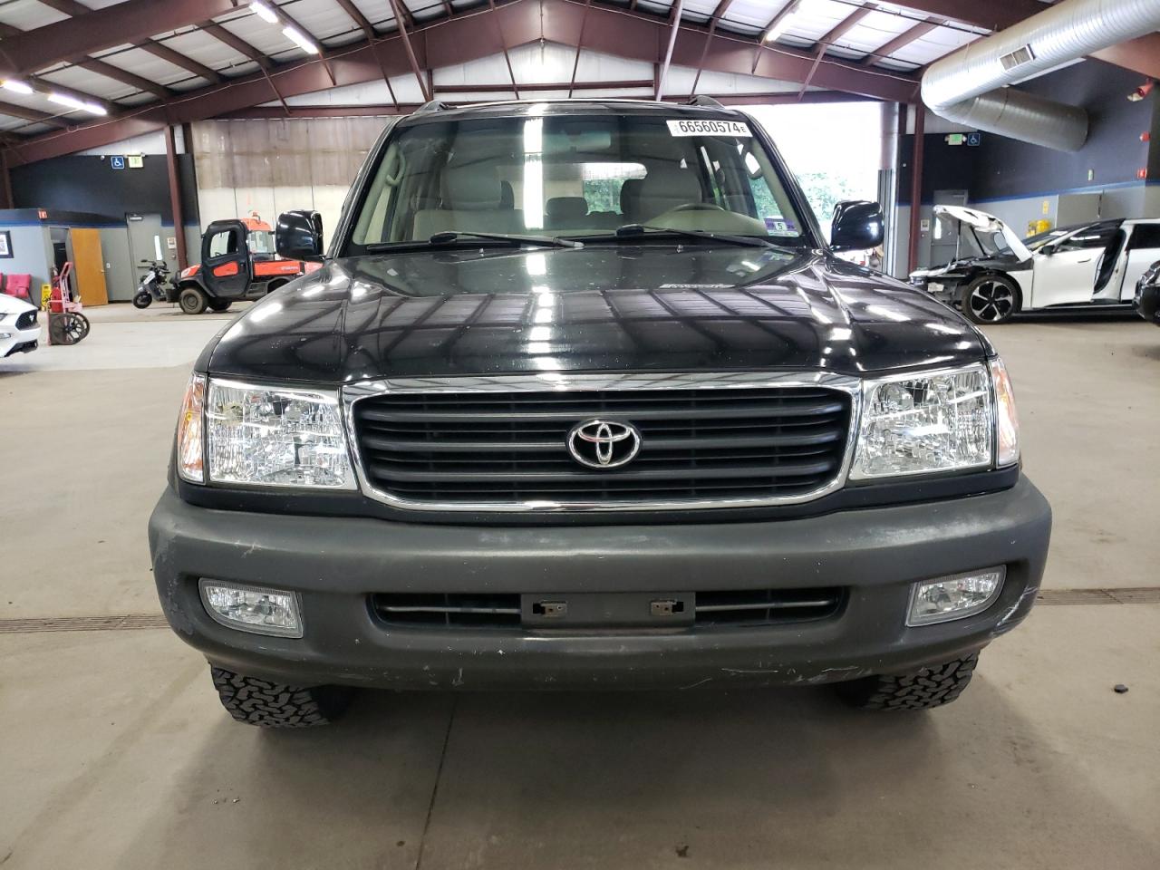 1999 Toyota Land Cruiser VIN: JT3HT05J2X0064180 Lot: 66560574