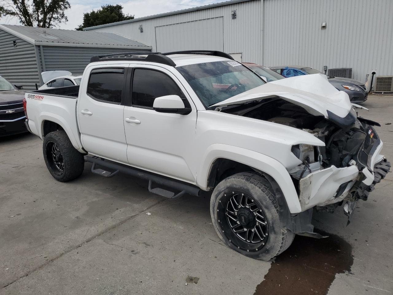 VIN 5TFCZ5ANXKX182990 2019 TOYOTA TACOMA no.4