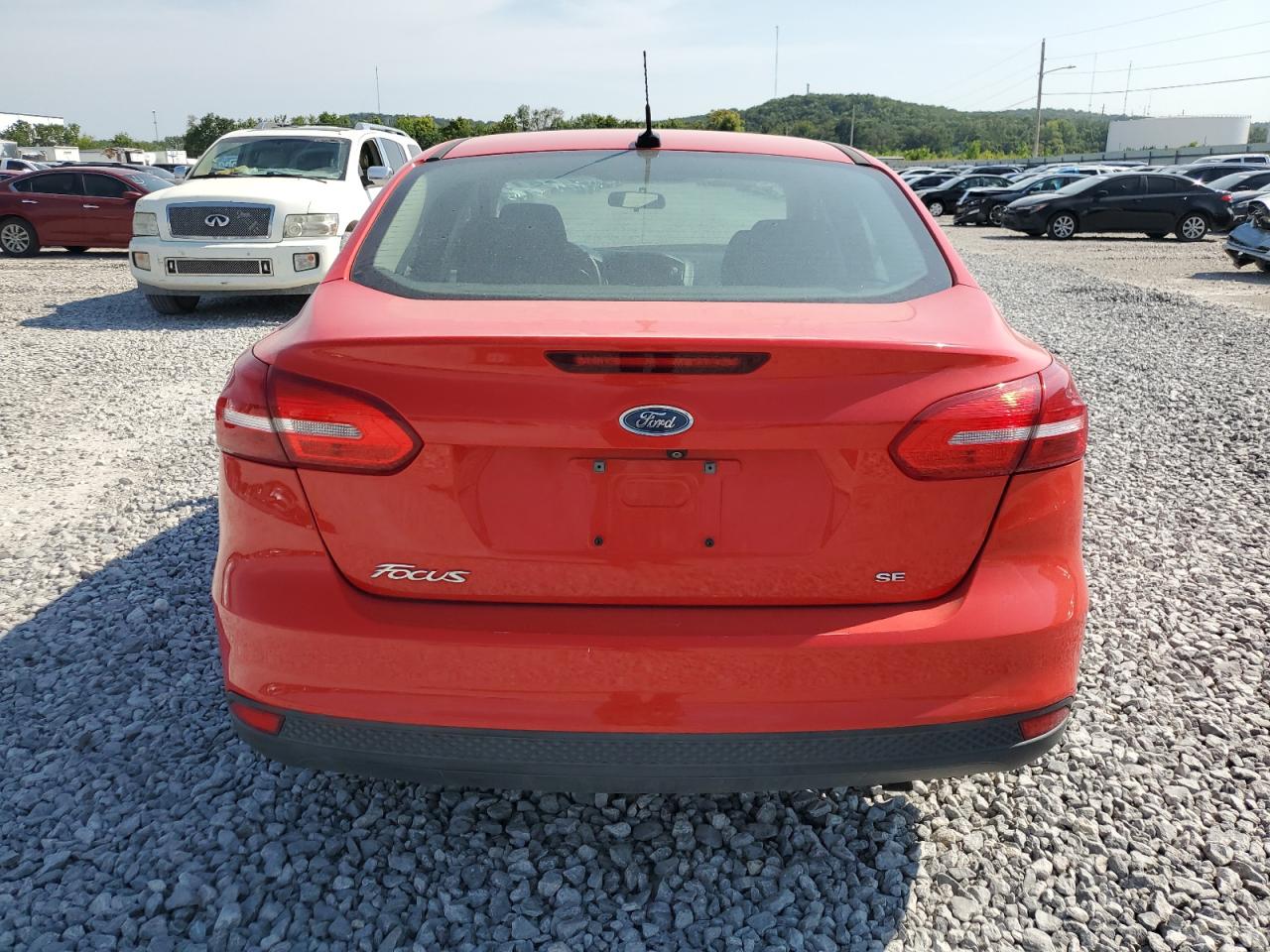 2015 Ford Focus Se VIN: 1FADP3F23FL318098 Lot: 68051534