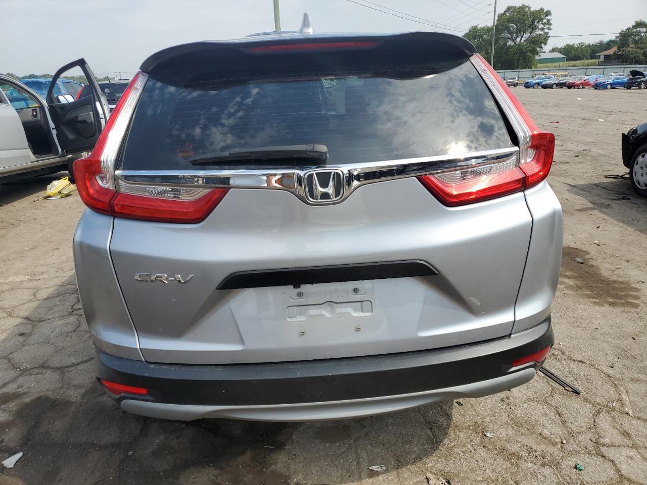2017 Honda Cr-V Lx VIN: 7FARW5H39HE001215 Lot: 67880084