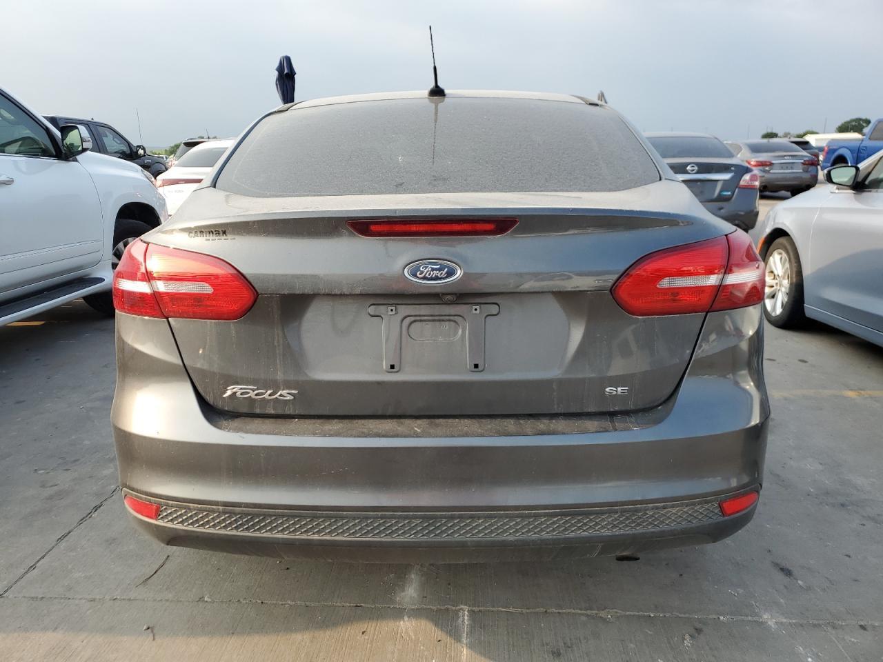2018 Ford Focus Se VIN: 1FADP3F28JL324262 Lot: 66474044