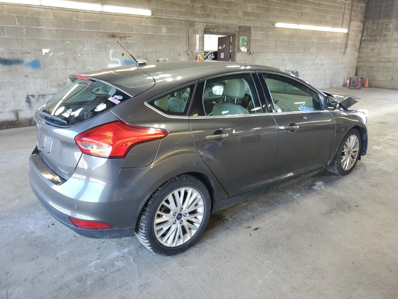 2016 Ford Focus Titanium VIN: 1FADP3N21GL330463 Lot: 66314324