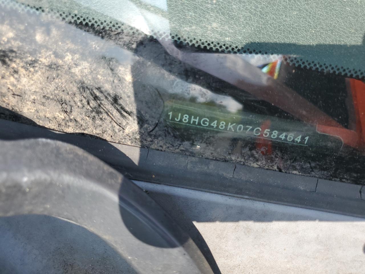 2007 Jeep Commander VIN: 1J8HG48K07C584641 Lot: 67302274