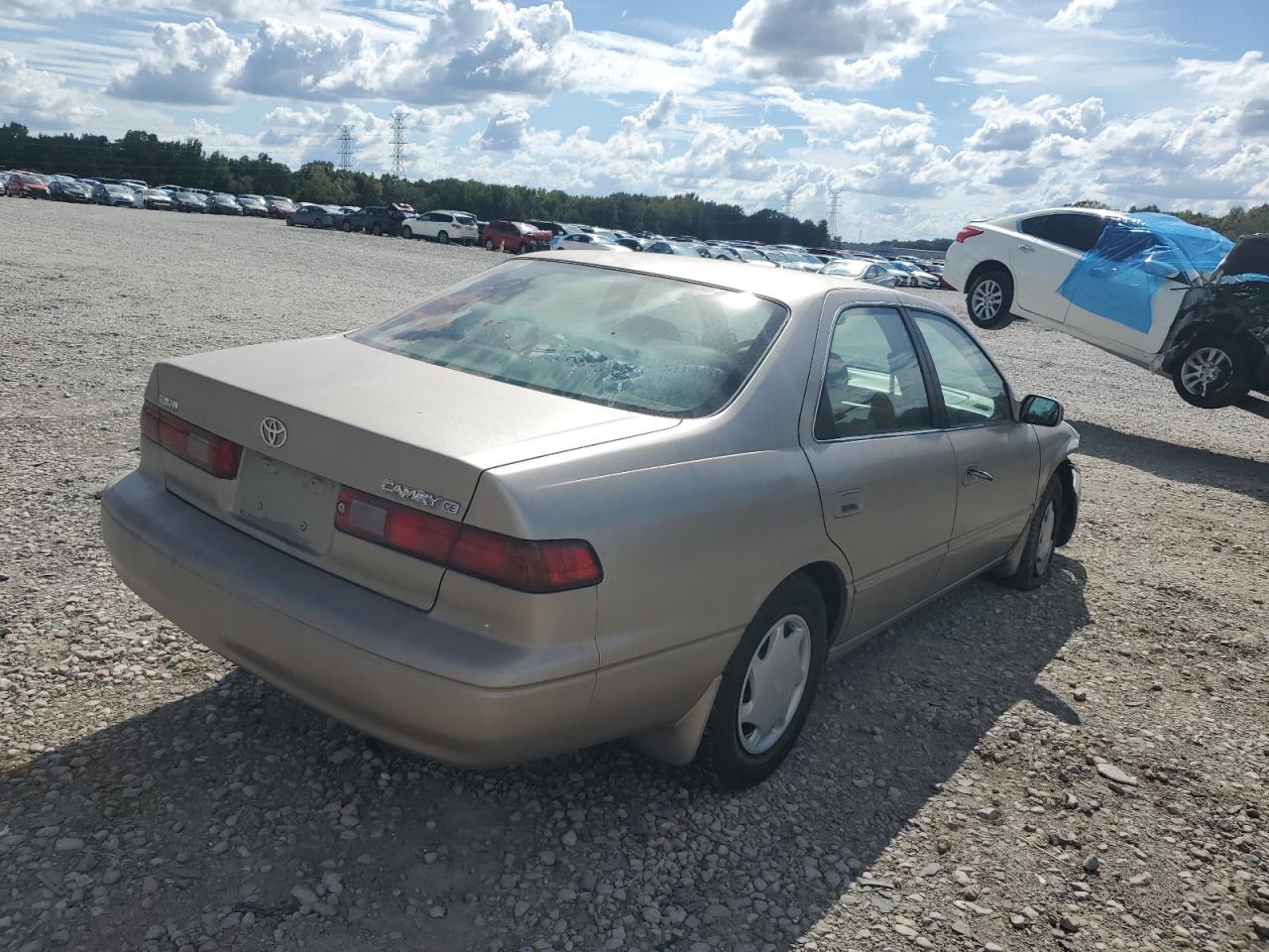 1999 Toyota Camry Ce VIN: 4T1BG22K0XU601762 Lot: 69799604