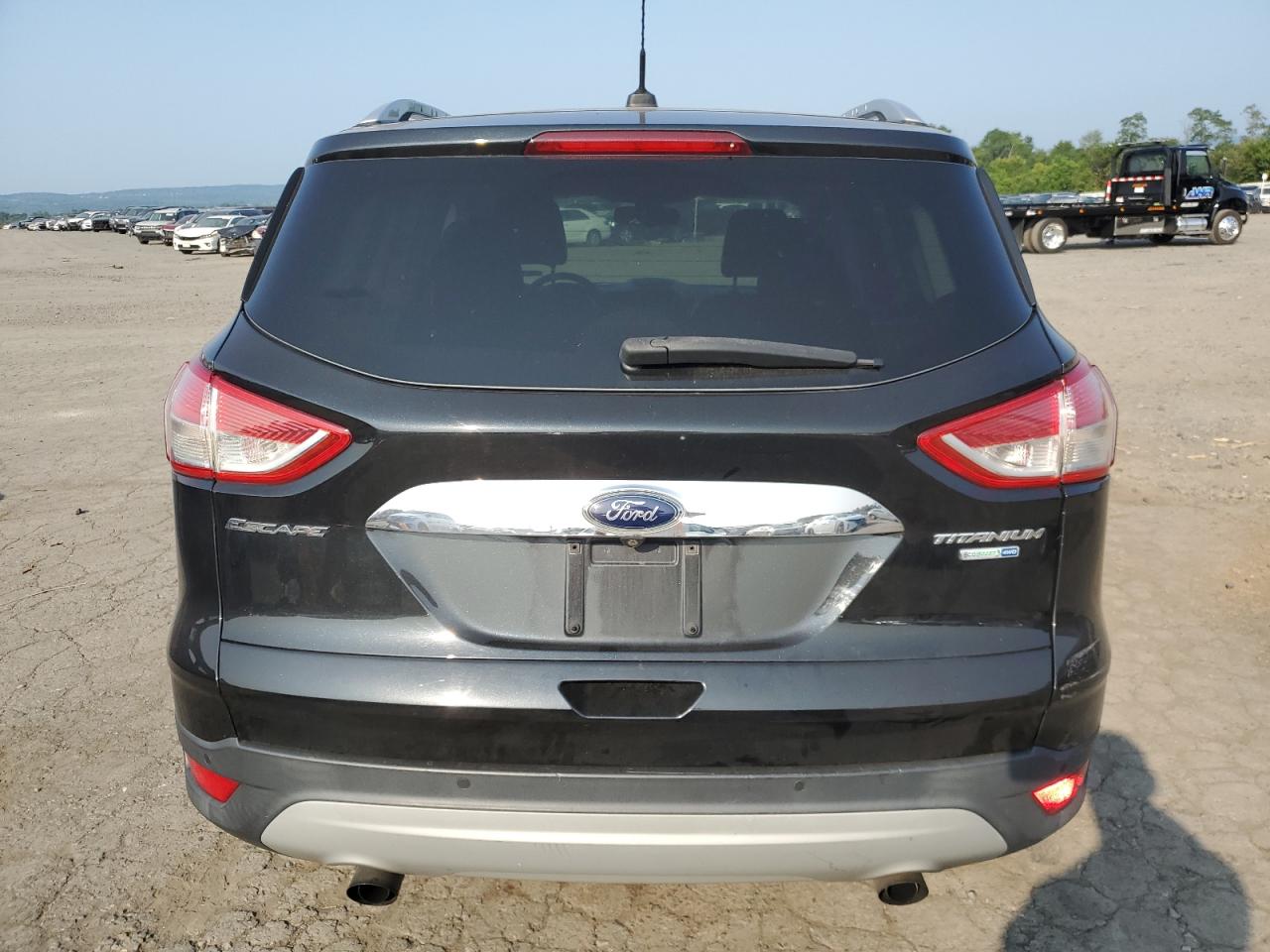 2015 Ford Escape Titanium VIN: 1FMCU9J93FUA56479 Lot: 67305524