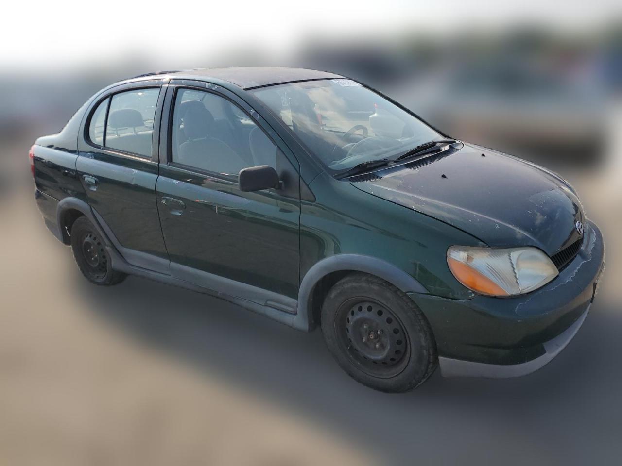 2000 Toyota Echo VIN: JTDBT1236Y0099299 Lot: 65713474