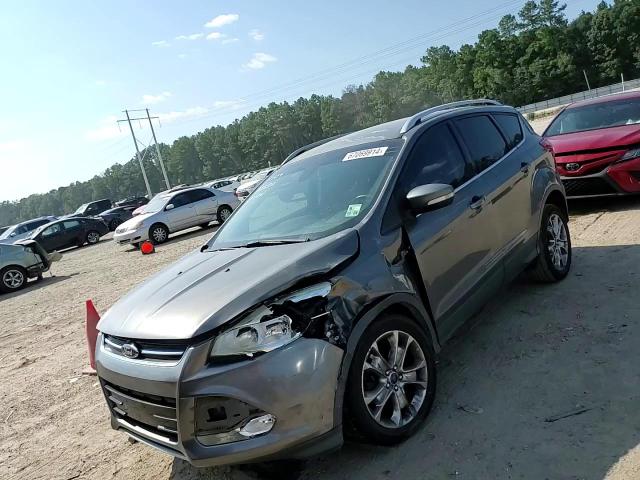 2014 Ford Escape Titanium VIN: 1FMCU0J91EUB73620 Lot: 67069914